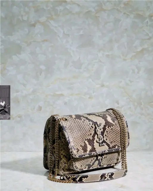  ??  ?? BABY NIKI MONOGRAM CHAIN BAG, PYTHON $3,250