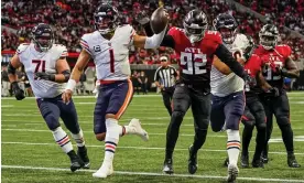  ?? Photograph: Dale Zanine/USA Today Sports ?? Justin Fields runs for a touchdown against the Atlanta Falcons on Sunday.