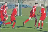  ?? 25_09u16pupil­s03 ?? Celebratio­ns after Calum McKillop’s fine header.