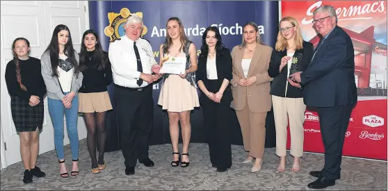  ?? (Pic: Garda Paul Murphy) ?? The Young Social Innovators Group from Loreto Secondary School, Fermoy receiving their award at the North Cork Garda Youth Awards from Chief Superinten­dent Con Cadogan and sponsor, Pat McDonagh.