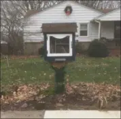  ?? ZACHARY SRNIS — THE MORNING JOURNAL ?? This Little Free Library is on the 300 block of Jackson Street in Amherst.