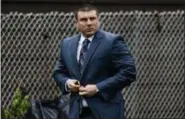  ?? EDUARDO MUNOZ ALVAREZ — THE ASSOCIATED PRESS ?? New York City police officer Daniel Pantaleo leaves his house Monday in Staten Island, N.Y. A long-delayed disciplina­ry trial is set to begin Monday for Pantaleo, accused of using a banned chokehold in the July 2014 death of Eric Garner.