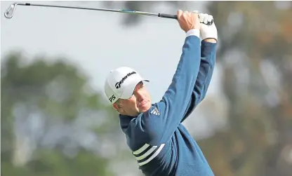  ?? Picture: Getty. ?? Martin Laird of Scotland plays a shot on the first hole during day one of the 2018 World Cup of Golf.