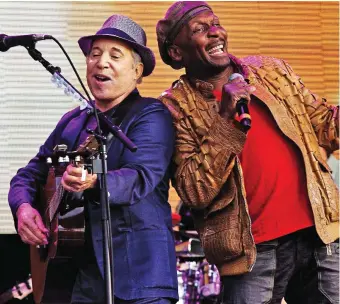  ??  ?? In harmony: Paul Simon and Jimmy Cliff. Inset: Paul Heaton and Jacqui Abbott