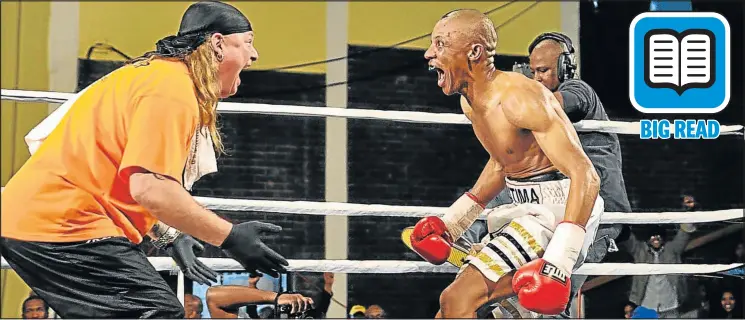 ??  ?? JUBILANT: Trainer Nick Durandt celebrates with Molefe Matima after one of his fights. The boxer will return to the ring after serving his two-year suspension for failing a doping test