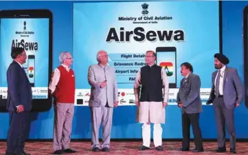  ??  ?? P. Ashok Gajapathi Raju, Minister of Civil Aviation, launching the AirSewa web portal and mobile app in the presence of Jayant Sinha, Minister of State, MoCA, R.N. Choubey, Secretary, MoCA, and other dignitarie­s
