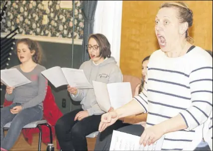  ?? LYNN CURWIN/TRURO DAILY NEWS ?? First Baptist Girls’ Choir director Bette Pring leads the girls in song during a recent practice. The choir’s annual gala takes place March 25.