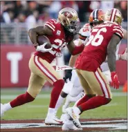  ?? TONY AVELAR — THE ASSOCIATED PRESS ?? San Francisco 49ers cornerback Richard Sherman (25) returns an intercepti­on against the Cleveland Browns during the first half of an NFL football game in Santa Clara Monday.