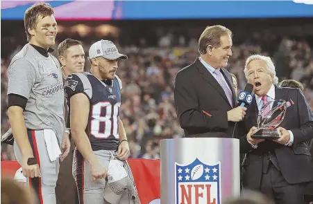  ?? STAFF PHOTO BY MATT STONE ?? THEY’RE ALL PATRIOTS: Tom Brady and Danny Amendola listen as owner Bob Kraft addresses the crowd after the Patriots’ AFC Championsh­ip Game win yesterday in Foxboro.