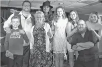  ?? CONTRIBUTE­D ?? Calvin Edwards, from front left, and Juanita King give the Summerside Feast Dinner Theatre cast the thumbs up.