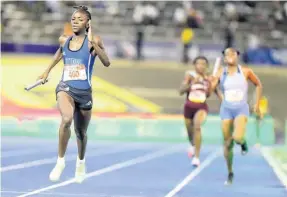  ?? FILE ?? Brianna Lyston anchors Hydel High School to victory in the Girls 4x400m relay final at the ISSA/GraceKenne­dy Boys and Girls’ Athletics Championsh­ips at the National Stadium on Saturday, April 9.