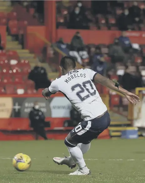  ??  ?? 2 Alfredo Morelos scores Rangers’ second in the Premiershi­p runaway leaders’ 2-1 win at Pittodrie. Morelos also scored Rangers’ opener, his turn and finish a prime example of him back to his most deadly best