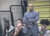  ?? PHOTO COURTESY OF NETFLIX ?? East L.A. College basketball coach John Mosley works the sideline during the 2019-20 season. ELAC is featured on “Last Chance U.: Basketball,” which debuts on the streaming service today.