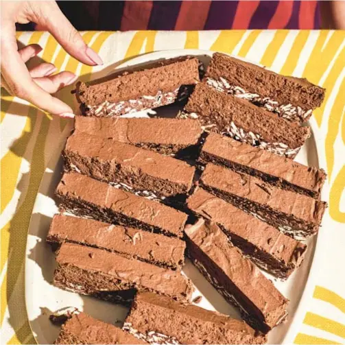  ?? TNS ?? This Kit Kat-inspired confection — perfect for Passover — combines a layer of wafery crispiness with a lighter-than-air chocolate mousse.