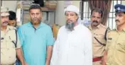  ??  ?? Hamza Thalasserr­y (in white) and Mohamed Manaf arrested on Thursday for alleged links with the Islamic State. HT PHOTO