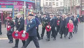  ?? ?? The parade from Queen Street Methodist Church to the lifeboat house. Photo: Tom Fox