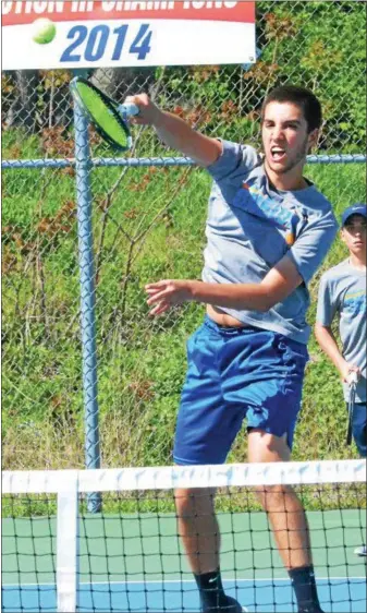  ?? PHOTOS BY KYLE MENNIG – ONEIDA DAILY DISPATCH ?? Oneida’s Jordan O’Connell smashes the ball at the net during a first doubles match against New Hartford in Oneida on Monday.