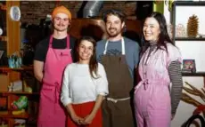  ?? ?? From left: Sous-chef Dylan Jennings, coowners Sara Markey and Andrew Brady, and general manager Ali Garvin at June Bug. Shuggie’s (left) and Chimney Sweep (top right) pizzas.