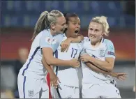  ??  ?? England’s Nikita Parris, centre, celebrates scoring what proved to be the winning goal against Portugal