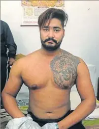  ?? HT PHOTO ?? Hardeep Singh, alias Shera, 21, was arrested by the Baghapuran­a police from a gym in Fatehgarh Sahib on November 20.