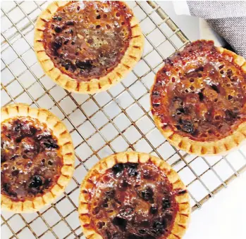  ??  ?? These old-fashioned butter tarts are a classic choice for sweetening up Mother’s Day.