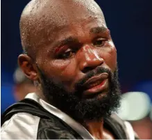  ??  ?? WAR WOUND: Takam displays the nasty cut above his right eye