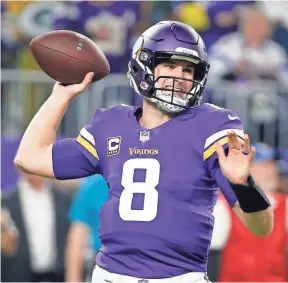  ??  ?? Vikings quarterbac­k Kirk Cousins throws a pass against the Packers on Sunday in Minneapoli­s. BRUCE KLUCKHOHN/AP