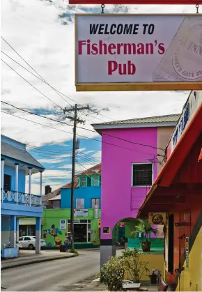  ??  ?? ABOVE LEFT: Atlantis Hotel, BathshebaA­BOVE: Colourful Speightsto­wn