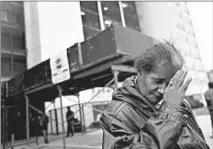  ?? HEATHER CHARLES/CHICAGO TRIBUNE ?? Annie Ricks stands outside the remaining high-rise building at CabriniGre­en on Nov. 30, 2010. She was the last resident to move out. Her grandson, Janari, was slain near the Cabrini-Green rowhouses in 2020.