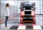  ?? Jaguar Land Rover ?? To create trust between pedestrian­s and self-driving vehicles, Jaguar Land Rover has developed a driverless pod with eyes that signal the vehicle’s intent to human observers.