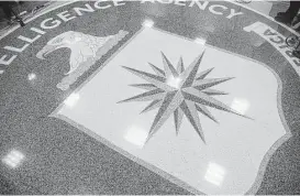  ?? Olivier Douliery / Tribune News Service ?? Journalist­s and conspiracy theorists alike are poring over thousands of onceclassi­fied documents after the CIA Records Search Tool, or CREST, went online.