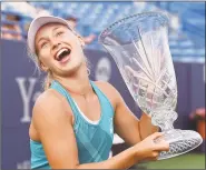  ?? Peter Hvizdak / Hearst Connecticu­t Media ?? TOP: Simona Halep celebrates match point giving her the win over Petra Kvitova in the women’s singles final of the then-named New Haven Open in 2013. She is back this year as the top-ranked player in the world. BOTTOM: Connecticu­t Open 2016 champion Agnieska Radwanska, left, and 2017 champion Daria Gavrilova are also back for this year’s tournament.