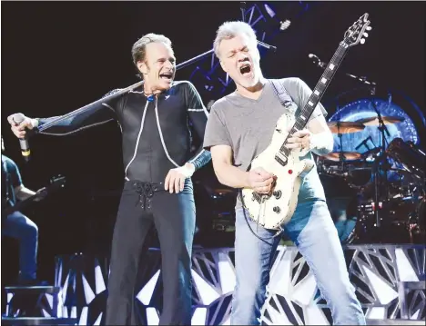  ??  ?? David Lee Roth, (left), and Eddie Van Halen of Van Halen perform in Wantagh, NY on Aug 13, 2015. Van Halen, who had battled cancer, died Oct 6. He was 65. (AP)