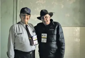  ??  ?? Baker (right) talks with former prison guard Jim Albright in a room in the former federal prison in San Francisco Bay during the reunion. The National Park Service said it will be the last get-together because the number of Alcatraz alumni has dwindled.