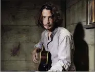 ?? CASEY CURRY — THE ASSOCIATED PRESS ?? In this July 29, 2015, photo, Chris Cornell plays guitar during a portrait session at The Paramount Ranch in Agoura Hills, Calif.