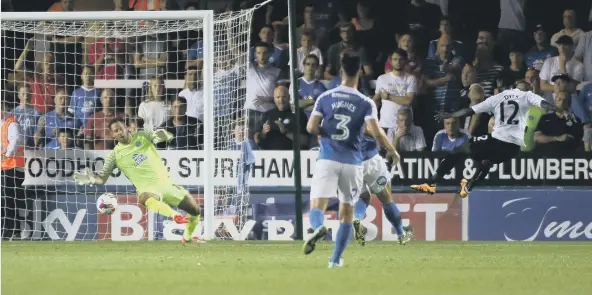  ??  ?? Mark Tyler pulls off a fine save to deny Swansea’s Nathan Dyer.