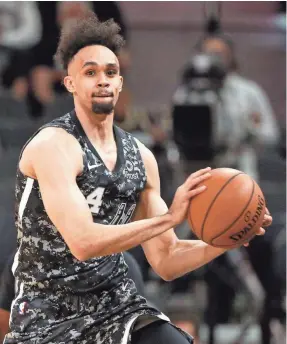  ?? SOOBUM IM, USA TODAY SPORTS ?? Spurs guard Derrick White has averaged 19.3 points in the Nuggets series.