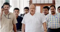  ?? PTI ?? Kerala Transport Minister Thomas Chandy leaves his office at Secretaria­t in Trivandrum on Wednesday. —