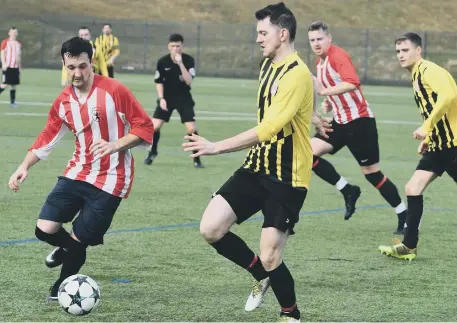  ??  ?? Sunderland Sunday League action as Lakeside SSC (red and white) take on Millfield Free Gardeners yesterday. Pictures by Kevin Brady.
