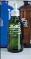 ?? ALI RAINER/CLEANING ESSENTIALS VIA AP ?? Some of the company’s reusable glass cleaning bottles available online and in stores.