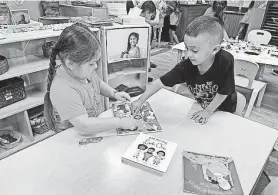  ?? CHILD CRISIS ARIZONA ?? A boy and a girl play together at Child Crisis Arizona’s Early Head Start program in Mesa, Arizona.