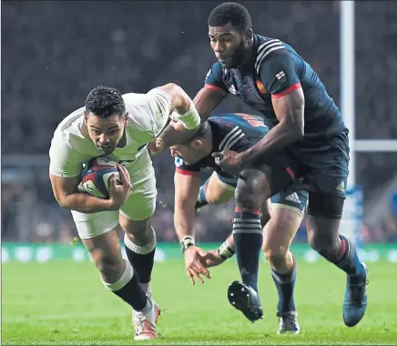  ?? Picture: Getty ?? THE BREAKTHROU­GH: England’s Ben Te’o dives to score his side’s first try against Les Bleus at Twickenham.