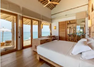  ??  ?? Clockwise from above: The twobedroom water retreat offers views of the azure sea; Once Upon A Table seats eight and has been designed as a culinary theatre; The Den, Soneva Fushi’s kids’ area is built over 1,300 square metres.