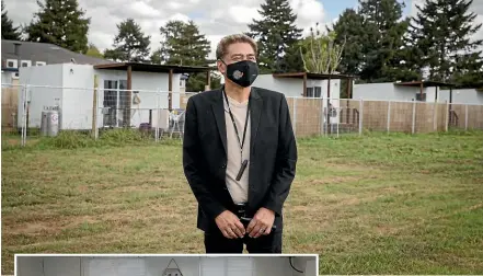  ?? KELLY HODEL/STUFF ?? Te Hauora o Ngāti Hauā chief executive Darrin Haimona pictured in front of the units, which overlook the Kaimai Ranges. The fullyfurni­shed units, pictured left, can sleep an entire family and are available to Ngāti Hauā whanau who may be sick, or vulnerable to Covid.