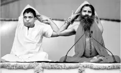  ?? REUTERS ?? Acharya Balkrishna owns most of the stock, while Ramdev holds a minuscule share in Patanjali Ayurved, which they built into a business with $1.6 billion of annual revenue