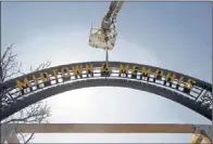  ??  ?? The old Chicago Pizza Factory sign, which now proclaims “Midtown is Memphis,” will frame the entrance to the patio at Chiwawa.