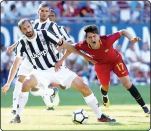  ??  ?? Juventus’ Giorgio Chiellini (left) and AS Roma’s Cengiz Under (right) tussles for the ball during their Internatio­nal Champions Cup 2017 match at Gillette Stadium in Foxboro, Massachuse­tts yesterday. –