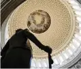  ?? PATRICK SEMANSKY AP ?? Painted in 1865 by Constantin­o Brumidi, “The Apotheosis of Washington” depicts the first president rising to the heavens in glory.