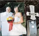  ?? DAVID GOLDMAN/AP ?? Carol Dean recovered a wedding photo in the debris. Her husband, David Wayne Dean, died in Sunday’s twister.