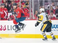  ?? NICK WASS/THE ASSOCIATED PRESS ?? Capitals centre Chandler Stephenson tries to get the jump on Penguins right wing Phil Kessel on Thursday in Washington.